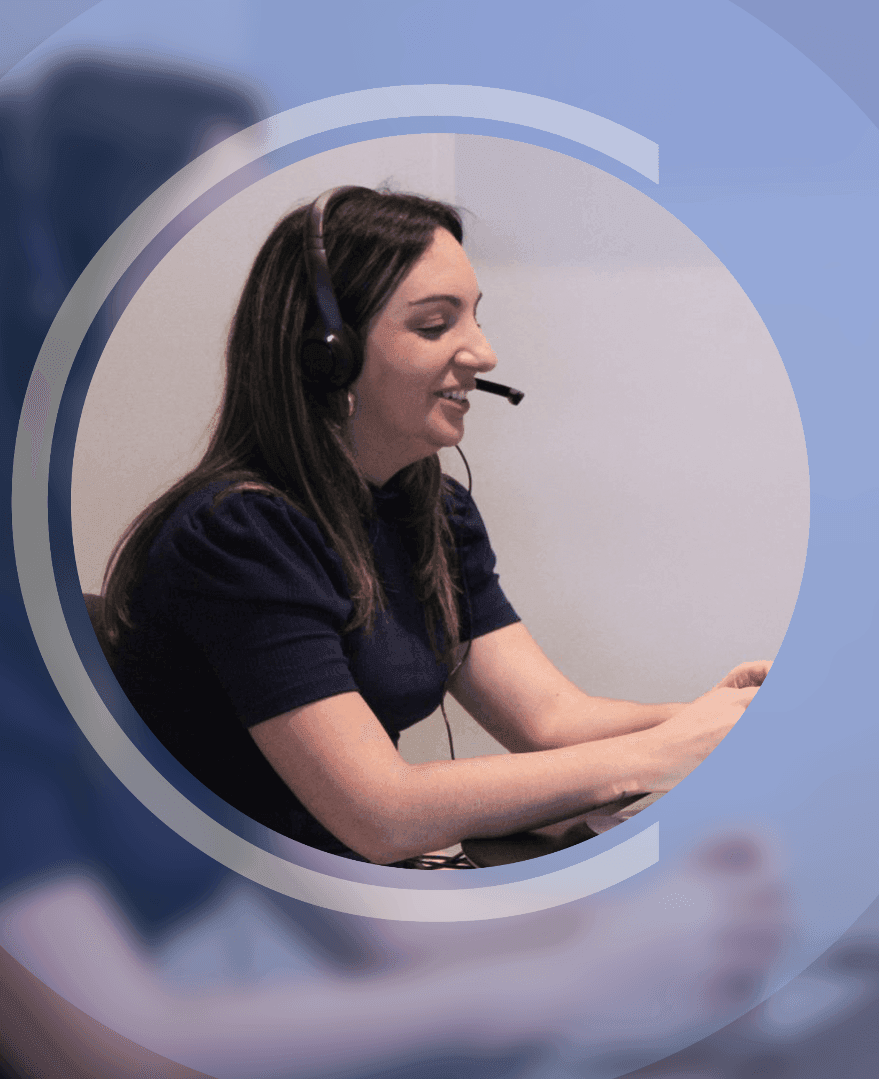 Young female professional working at a laptop